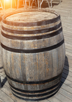 old wooden barrel sunset