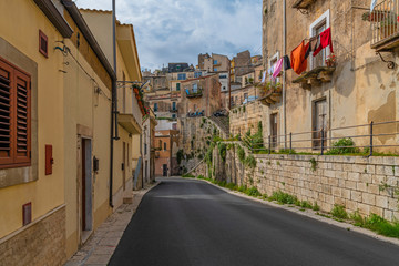 View of the italian street at the old baroque town Ragusa in Sicily, Italy