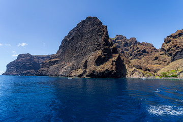 Vertical cliffs Acantilados de Los Gigantes (Cliffs of the Giants). View from Atlantic Ocean. Tenerife. Canary Islands. Spain.