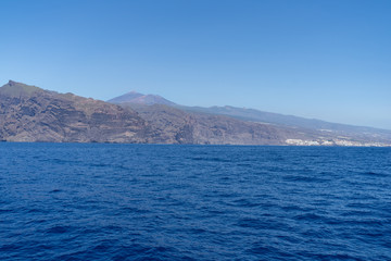 Vertical cliffs Acantilados de Los Gigantes (Cliffs of the Giants). View from Atlantic Ocean. Tenerife. Canary Islands. Spain.