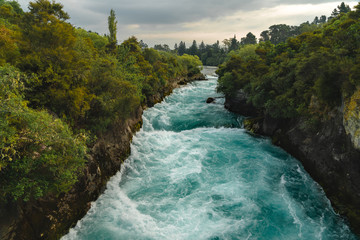 Huka Falls. The Huka Falls are a set of waterfalls on the Waikato River that drains Lake Taupo in New Zealand.