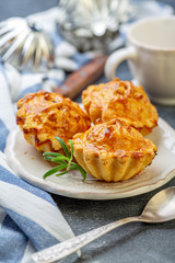 Homemade mini minced meat pies on a plate.