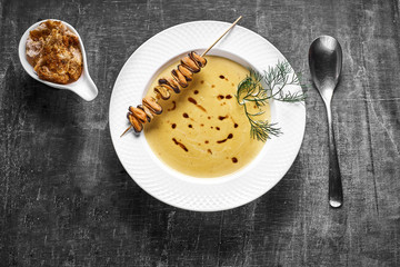 Curry cream soup with coconut milk and mussels