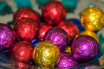 Round and colorful chocolate bonbons.