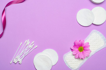 Obraz na płótnie Canvas Feminine Hygiene Concept, Woman's Sanitary Products on Pink Background