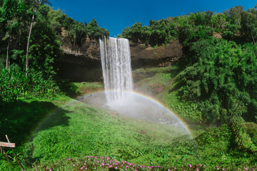 Tad Tayicsua or Tad Alang Waterfall with a rainbow near Pakse, Southern Laos
