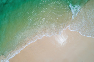 Fototapeta na wymiar Aerial top view beautiful sea landscape, beach and wave with turquoise sea water with copy space