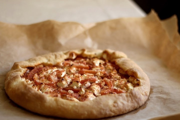 Tomato and feta cheese, seasoned with smoked pepper. Selective focus.