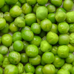 Green peas on a plate close-up. Healthy eating concept.