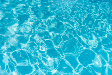 Blue ripped water in swimming pool. water surface background.