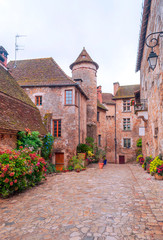 Fototapeta na wymiar Medieval village of Aquitaine with its stone houses in the south of France on a cloudy day.