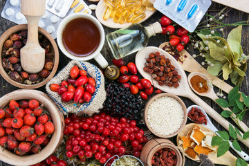 Medicinal tablets and pills and herbs composition: Dog rose, bunch branch Rosehips, types Rosa canina hips, essential oil. bunch, dried flowers of linden and chamomile elderberries and goji berries. 