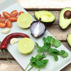 Avocado, onion, tomaten, chili, ingredients for guacomole