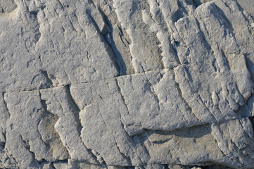 Natural background texture of a hard stone with a rump plan.