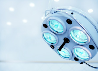 Surgical lamp close-up on the background of a modern operating room in the clinic. Copy space. Your...