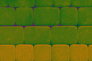 Obraz premium Beautiful multicolored paving stones laid evenly.