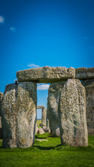 Stonehenge unesco world heritage site near Salisbury in England. Summer holidays destination in the UK, Europe. View of stone archways at Stonehenge in British countryside on a sunny day, England.