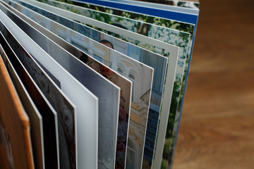 photobook pages close up. brown open family  photo book with  leather cover with copy space for...