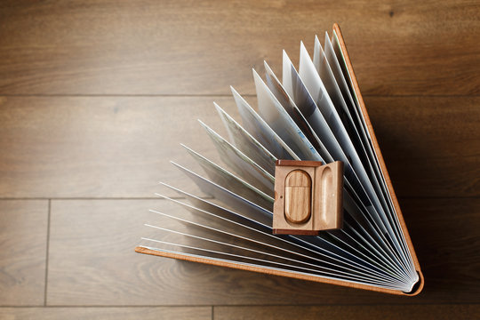 photobook pages.
brown photo book with  leather cover.
Photo album with a hard cover 

photo book opened
