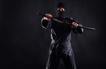 Ninja with katana background © Dmytro