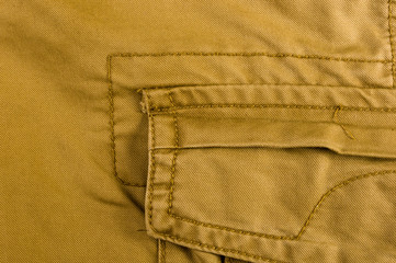 clothing items washed cotton fabric texture with seams, clasps, buttons and rivets