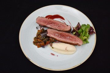 Grilled beef steak with rosemary, salt and salad