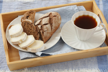 Breakfast with goat cheese and coffee