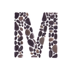 M Letter made of black beach stones isolated on white background