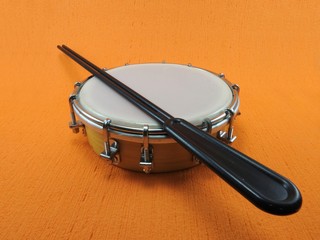 Tamborim and drumstick: a Brazilian percussion musical instrument. It is used to play samba, the...