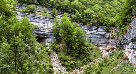 Obraz na płótnie Canvas Waterfall in France. Les cascades du hérisson in Le Frasnois, France, Europe.