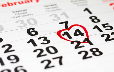 Calendar with the date of  February 14 Valentine's day with red heart mark