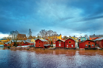 Old historic Porvoo, Finland with wooden houses and medieval stone and brick Porvoo Cathedral at...