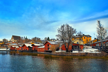 Fototapeta premium Old historic Porvoo, Finland with wooden houses and medieval stone and brick Porvoo Cathedral at blue hour sunrise