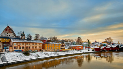 Fototapeta premium Old historic Porvoo, Finland with wooden houses and medieval stone and brick Porvoo Cathedral at blue hour sunrise