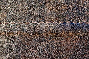brown leather surface with stitching, background, texture, macro