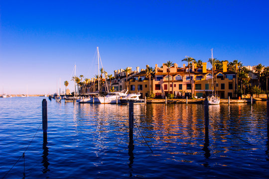 Port of Sotogrande. Port, sea, yachts and colorful houses. Sotogrande, Costa del Sol, Andalusia, Spain. Picture taken &ndash; 13 January 2019.