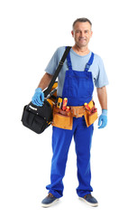 Electrician with tools wearing uniform on white background