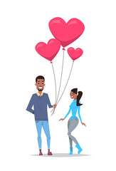 Man giving woman pink heart shape air