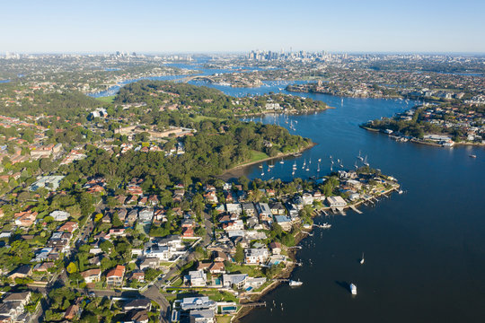 Aerial View Of The Parramatta River And The Sydney City Skyline To The East.