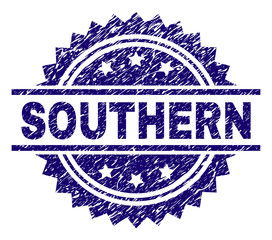 SOUTHERN stamp seal watermark with distress style. Blue vector rubber print of SOUTHERN caption with unclean texture.