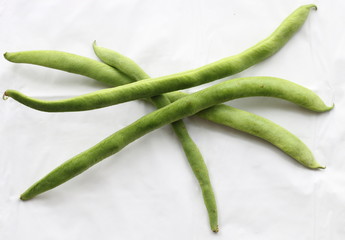 Green beans on white background