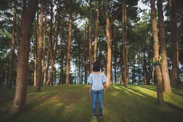 Fototapeta premium Happy young cute asian Japanese girl hipster backpack women travelling looking at beautiful sky mountains scenery views 