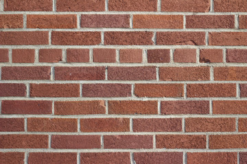 Obraz premium Grungy vintage reddish brown brick wall in common bond pattern