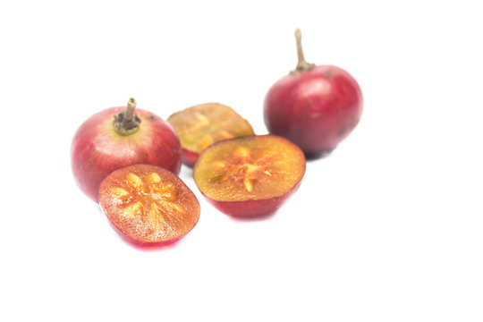 Flacourtia fruit Ramontchi isolate on white background

