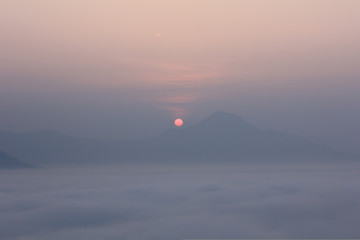 Sunrise and mist