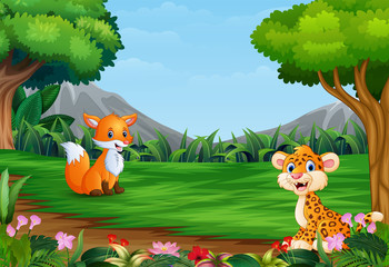 Obraz na płótnie Canvas Cartoon of leopard and a fox playing in the jungle