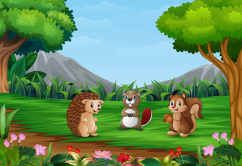 Happy small animals are playing in a beautiful landscape