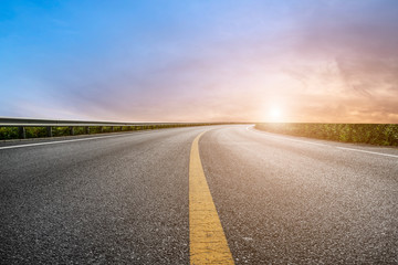 Naklejka premium Sky Highway Asphalt Road and beautiful sky sunset scenery