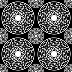 motif black and white barbaric circle wheel tribal chain tattoo seamless pattern vector background