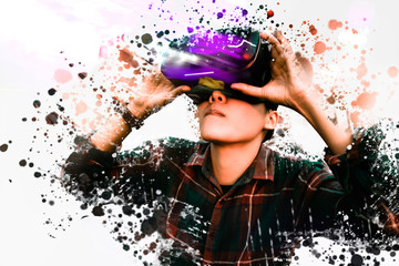 Asian man in Plaid shirt wearing glasses of glasses of virtual reality dissolving into pixels. Future technology Concept